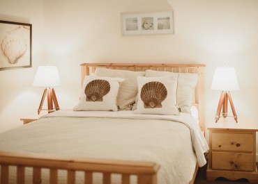 Master bedroom with queen-sized bed